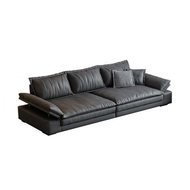 ピロートップアームとゆるい背中を備えたミッドセンチュリーモダンブラックソファ