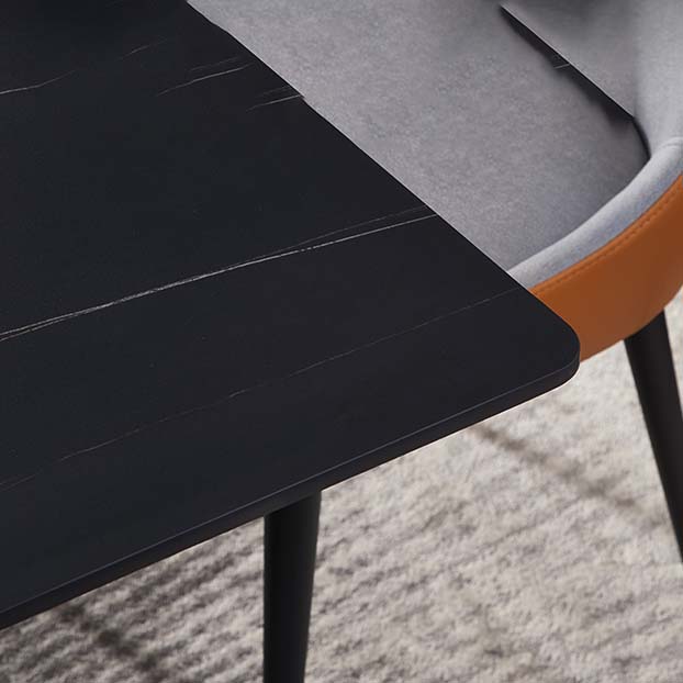 Tavolo da pranzo rettangolare industriale nero con piano in pietra e base in metallo