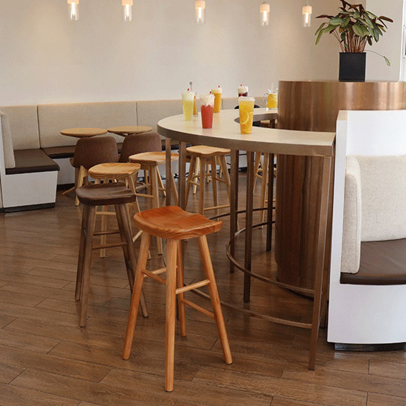 Moderne armloze backless counter kruk houten barkruk met pedaal voor binnen