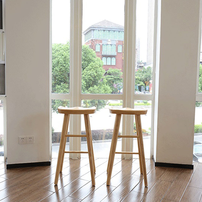 Moderne armloze backless counter kruk houten barkruk met pedaal voor binnen