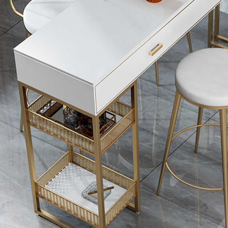 Bistro-bartafel van gesinterd steen, onderstel met goudkleurig frame en lades