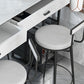 Bistro-bartafel van gesinterd steen, onderstel met goudkleurig frame en lades
