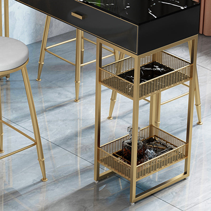 Bistro-bartafel van gesinterd steen, onderstel met goudkleurig frame en lades