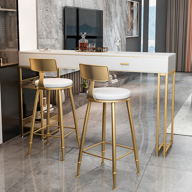 Bistro-bartafel van gesinterd steen, onderstel met goudkleurig frame en lades