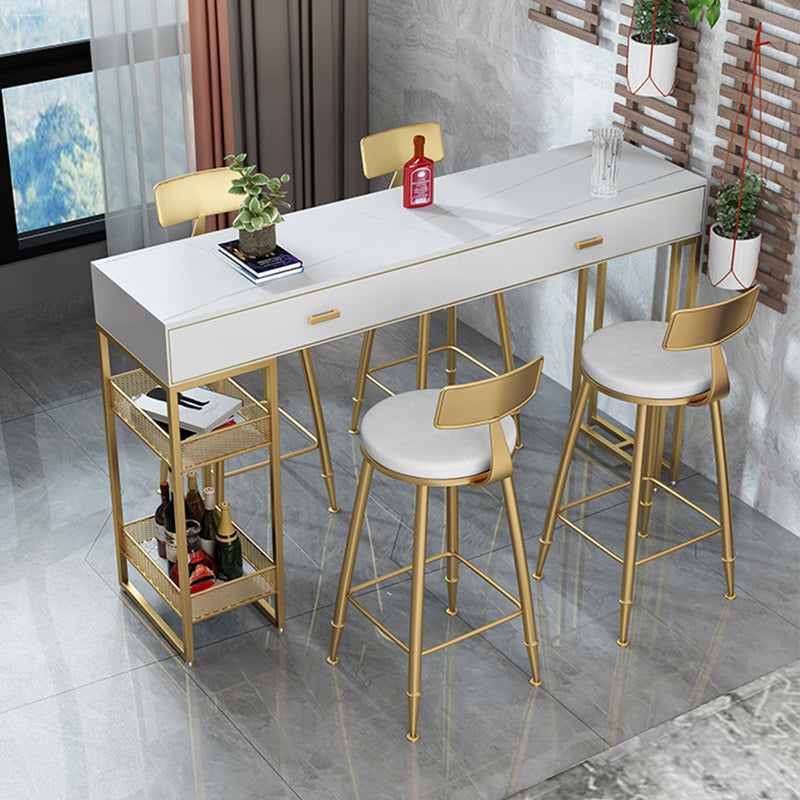 Bistro-bartafel van gesinterd steen, onderstel met goudkleurig frame en lades