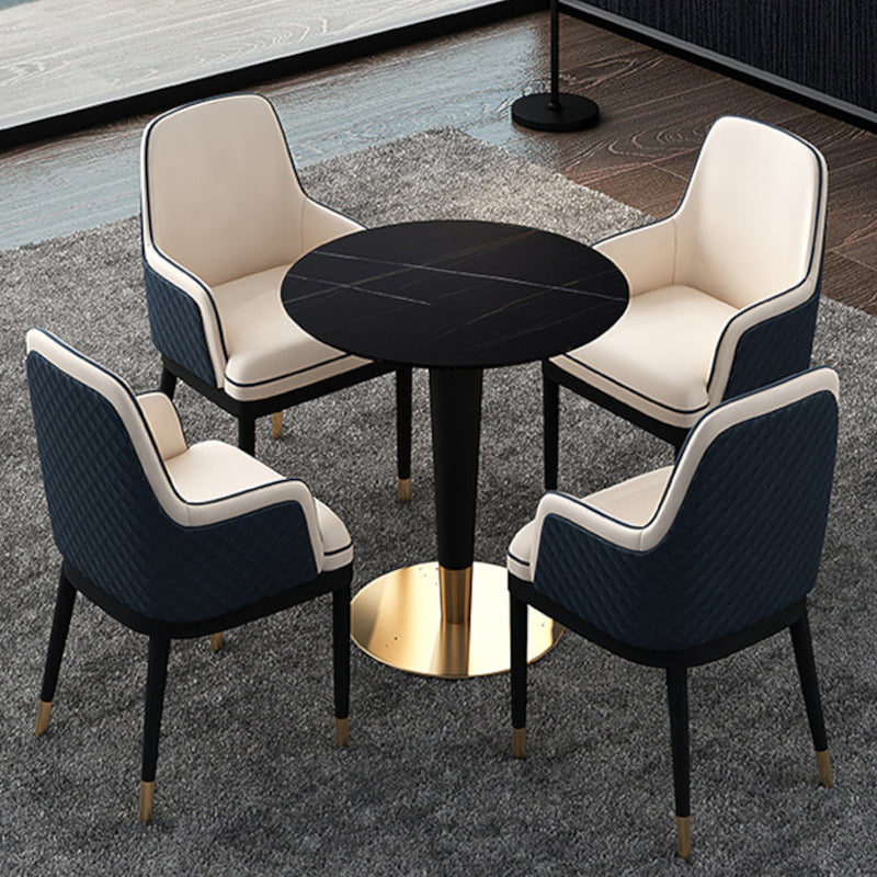 Table supérieure en pierre noire avec base de piédestal Table à manger ronde de luxe traditionnelle