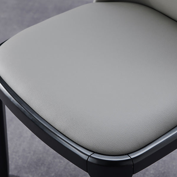 工業用アームレスダイニングチェアソリッドウッドの脚布張りのサイドチェア