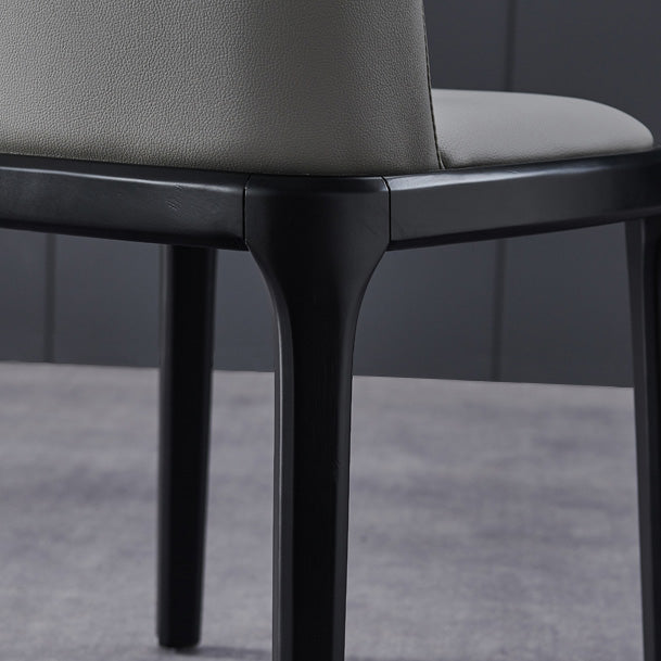 工業用アームレスダイニングチェアソリッドウッドの脚布張りのサイドチェア