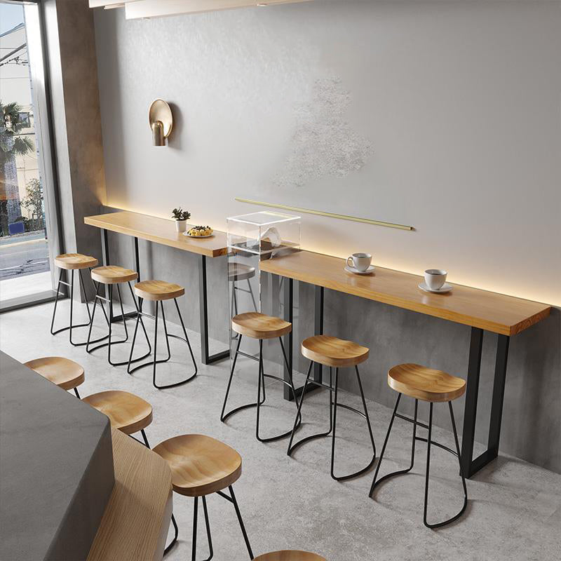 Brown Solid Wood Bar Table Black Legs and Metal Base Bar Table Clearhalo 'Bar Furniture' 'Bar Tables' 'bar_tables' 'furn' 'furn_bar_tables' 'Furniture' 'Kitchen & Dining Furniture' 6650278
