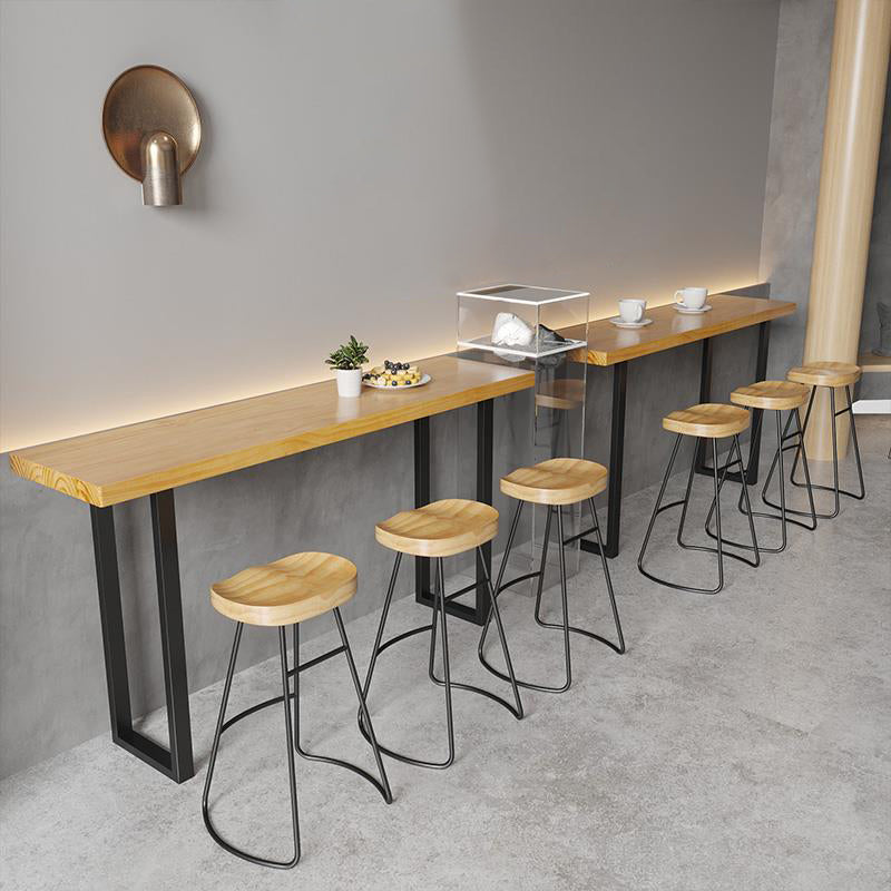 Brown Solid Wood Bar Table Black Legs and Metal Base Bar Table Clearhalo 'Bar Furniture' 'Bar Tables' 'bar_tables' 'furn' 'furn_bar_tables' 'Furniture' 'Kitchen & Dining Furniture' 6650280