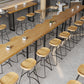 Brown Solid Wood Bar Table Black Legs and Metal Base Bar Table Clearhalo 'Bar Furniture' 'Bar Tables' 'bar_tables' 'furn' 'furn_bar_tables' 'Furniture' 'Kitchen & Dining Furniture' 6650282