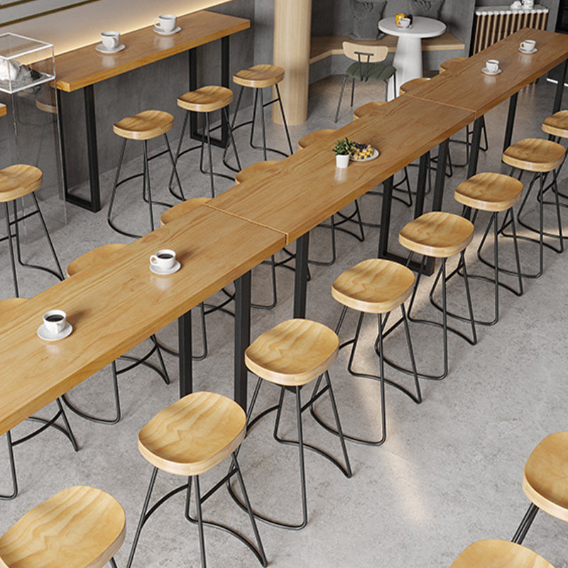 Brown Solid Wood Bar Table Black Legs and Metal Base Bar Table Clearhalo 'Bar Furniture' 'Bar Tables' 'bar_tables' 'furn' 'furn_bar_tables' 'Furniture' 'Kitchen & Dining Furniture' 6650282