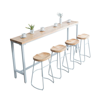 Brauner Bartisch aus massivem Holz, weiße Beine und Metallsockel