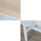 Brauner Bartisch aus massivem Holz, weiße Beine und Metallsockel
