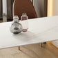 Moderne eettafel van gesinterde stenen met metalen poten voor thuisgebruik