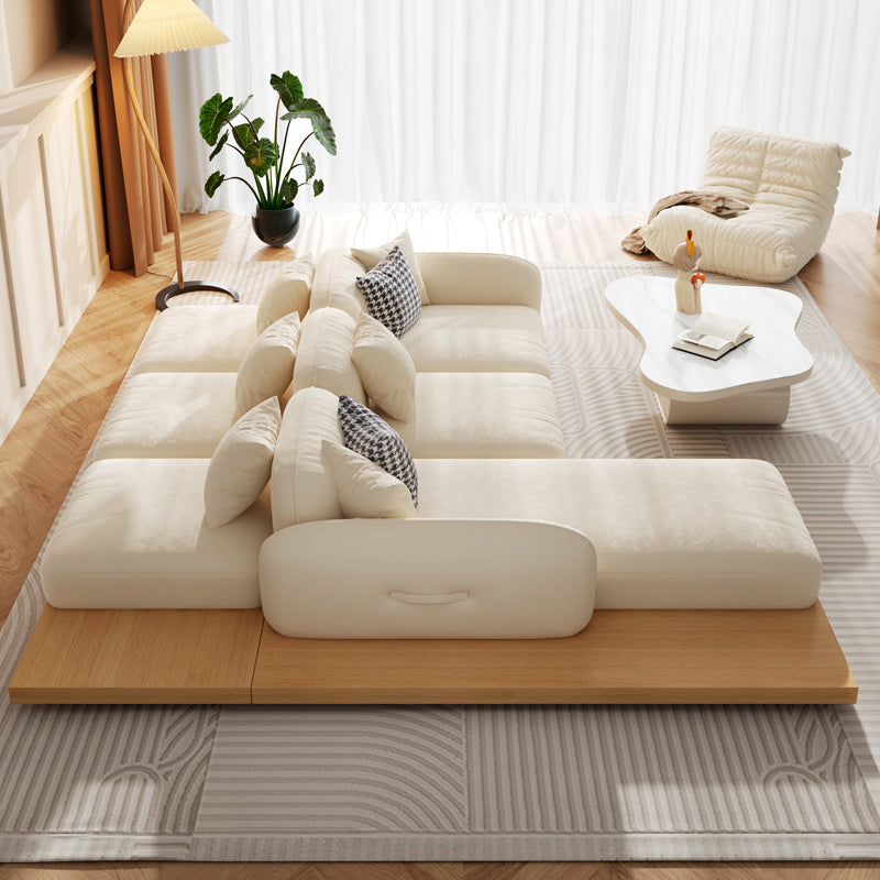 Divano sezionale di velluto contemporaneo con cuscini posteriori e braccia quadrate