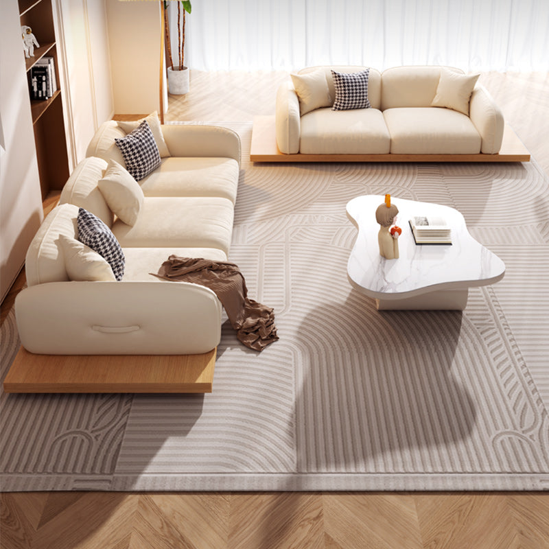 Divano sezionale di velluto contemporaneo con cuscini posteriori e braccia quadrate