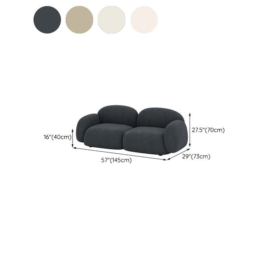 Cuscini contemporanei arrotolati del braccio di casa stazionario