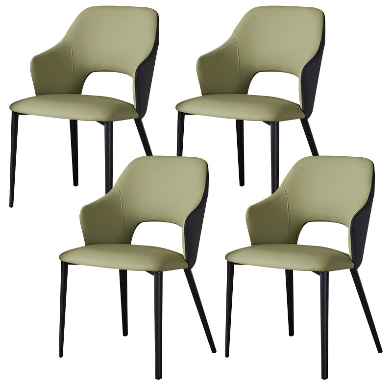 Eigentijdse kunstleren eetkamerstoelen met zwarte poten en fauteuil