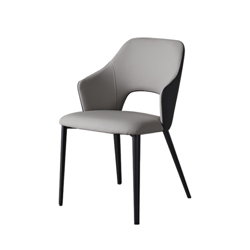 Eigentijdse kunstleren eetkamerstoelen met zwarte poten en fauteuil