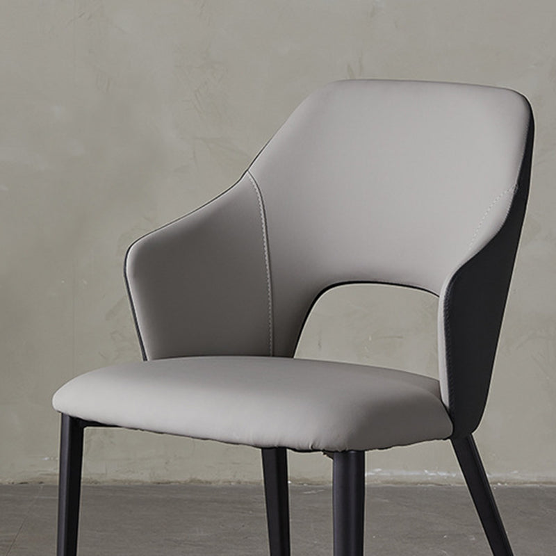 Eigentijdse kunstleren eetkamerstoelen met zwarte poten en fauteuil
