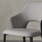 Eigentijdse kunstleren eetkamerstoelen met zwarte poten en fauteuil
