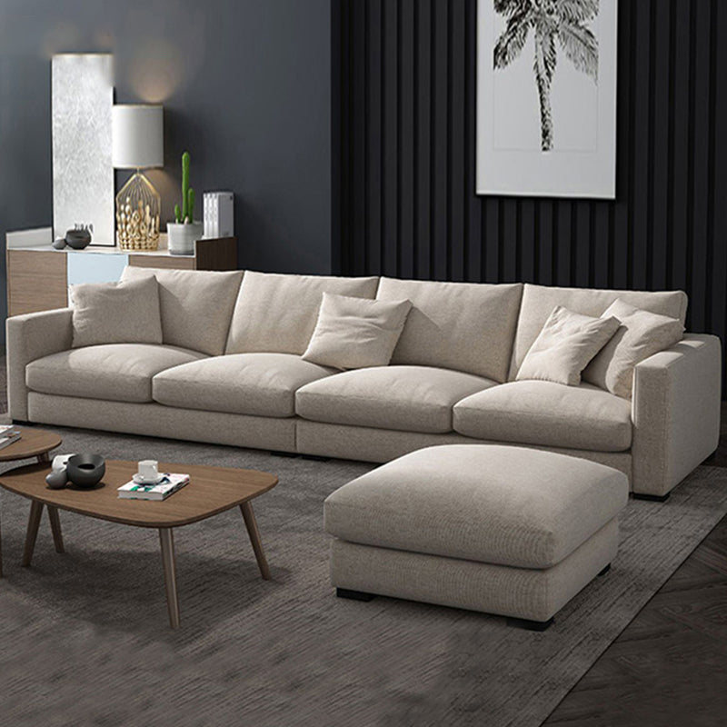 Canapé de bras carré standard avec oreillers siège en beige pour l'appartement