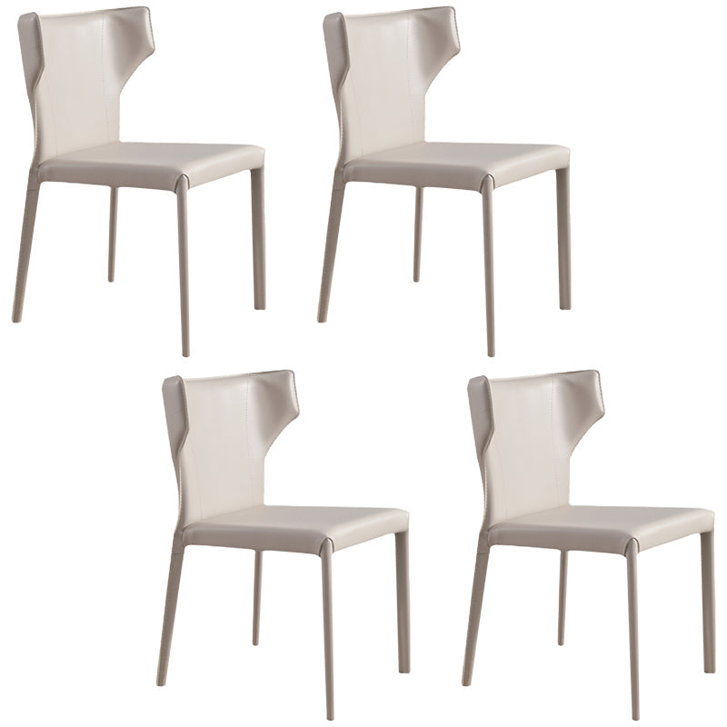 現代的なサイドチェアソリッドバックフェイクレザーダイニングルーム屋内の椅子