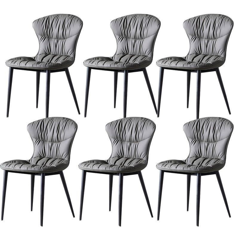 Silla de comedor de cuero falso silla sin brazo con piernas negras