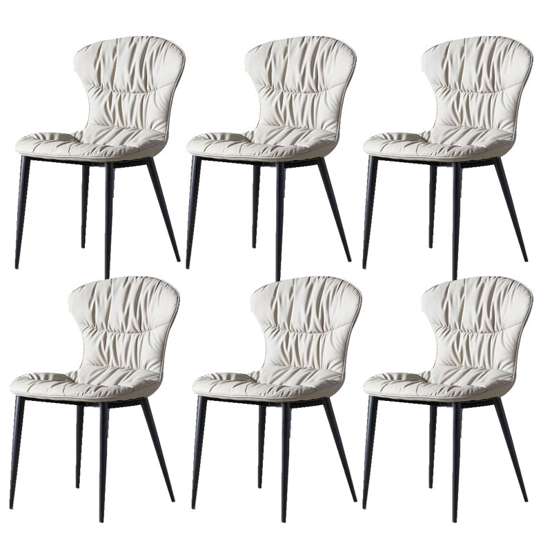 Silla de comedor de cuero falso silla sin brazo con piernas negras