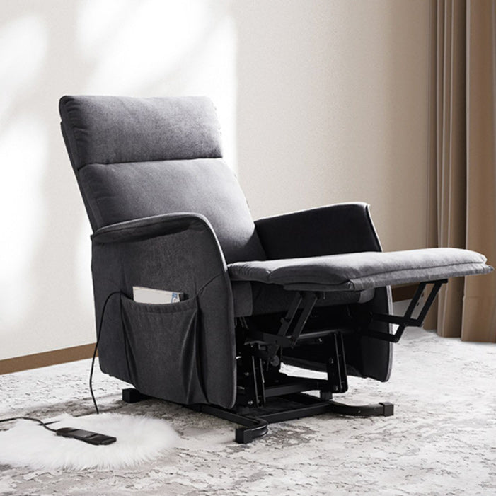 Sedia reclinabile in velluto in polvere grigio.