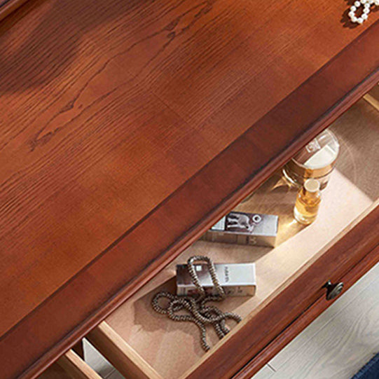 Vanità del tavolo da trucco marrone in legno massiccio con cassetti e specchio