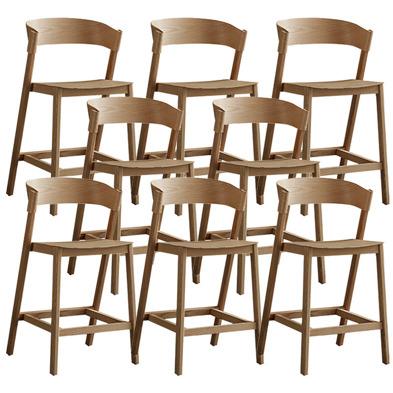 Tabourets de comptoir en bois brun