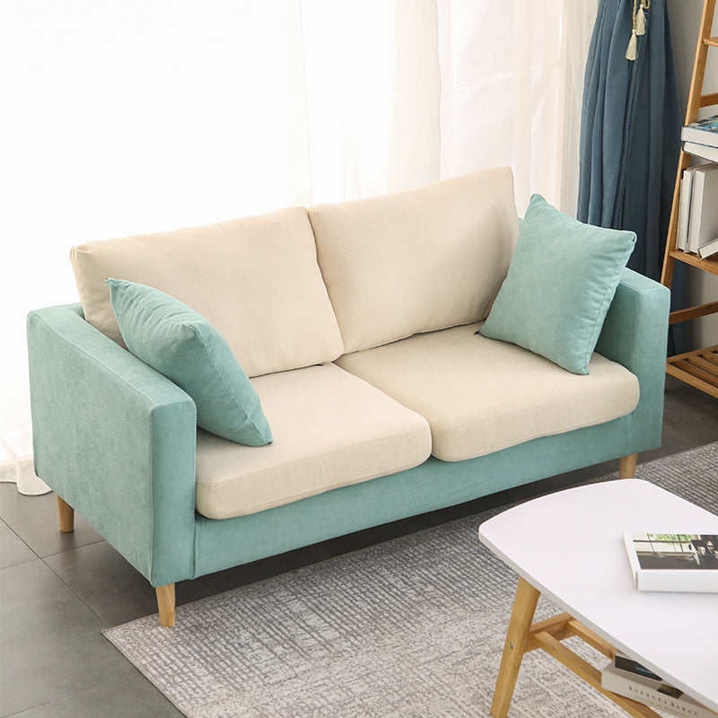 Canapé scandinave 2 places avec 2 oreillers en arrière et bras carrés