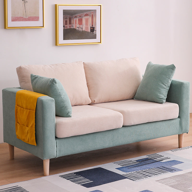 Canapé scandinave 2 places avec 2 oreillers en arrière et bras carrés