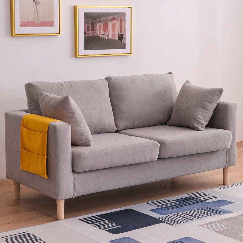 Canapé scandinave 2 places avec 2 oreillers en arrière et bras carrés