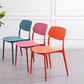 Silla de plástico sin brazo silla de comedor abierta para uso doméstico