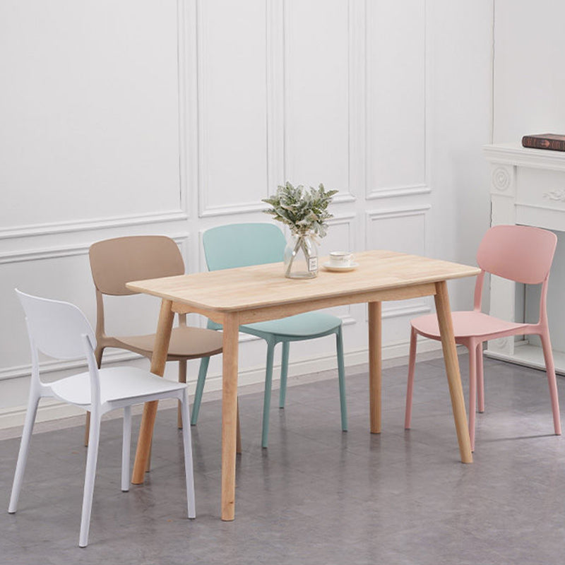 Silla de plástico sin brazo silla de comedor abierta para uso doméstico