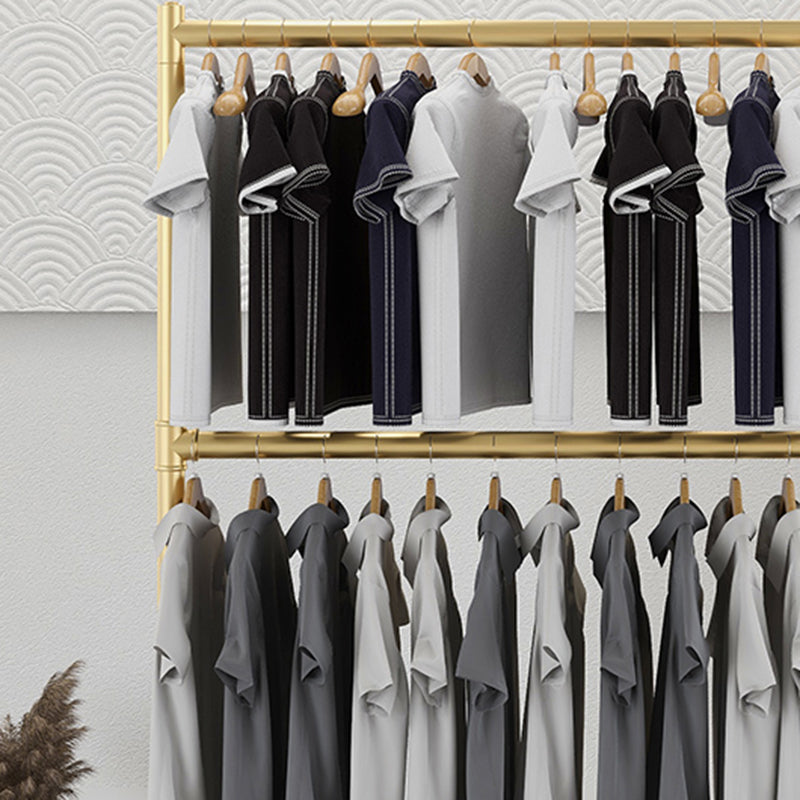 Eigentijdse hal staande hangende rails en castors metaal ingelijste jashanger