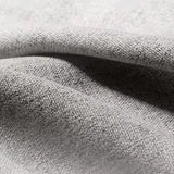 Sleeper de tela moderna en un futón de brazo acampanado gris claro y colchón con almacenamiento