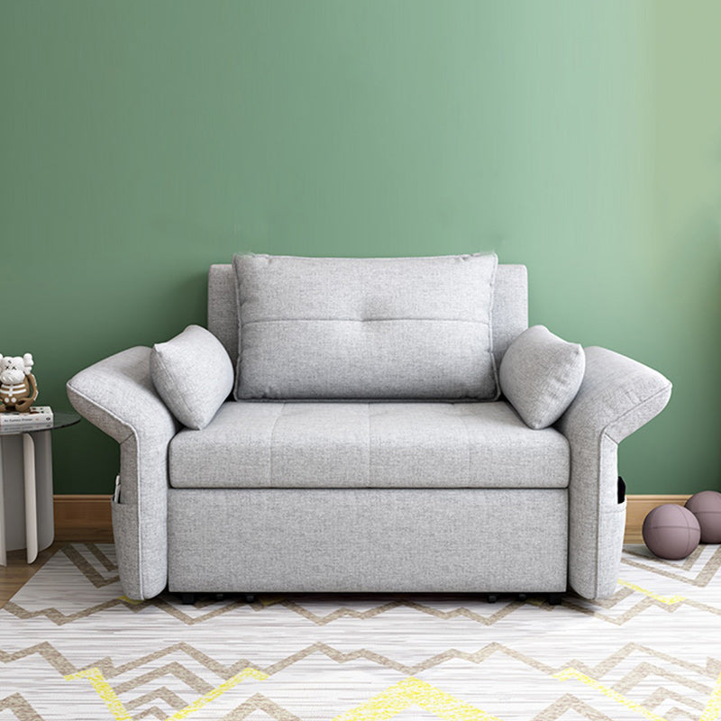 Sleeper de tela moderna en un futón de brazo acampanado gris claro y colchón con almacenamiento