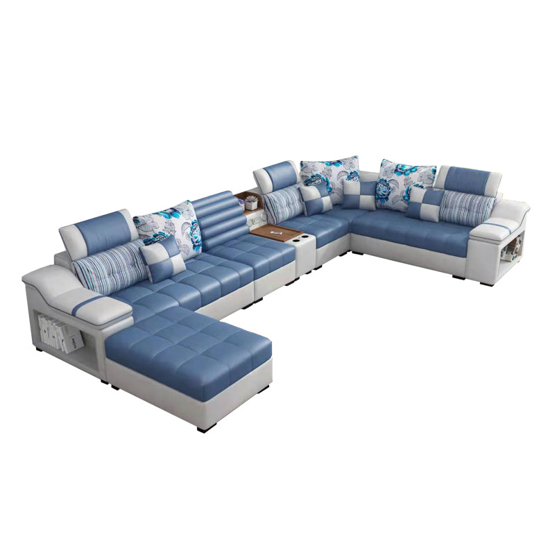 Divano in ecopelle e divano con chaise longue con braccioli e contenitori in blu