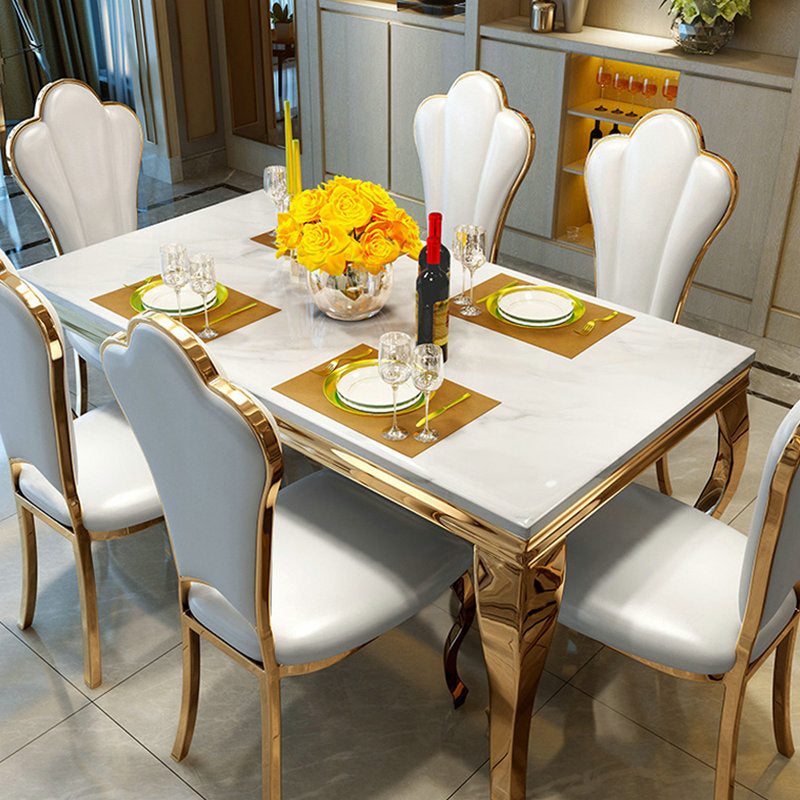 Luxe eettafel met gouden onderstel, keukentafel van imitatiemarmer