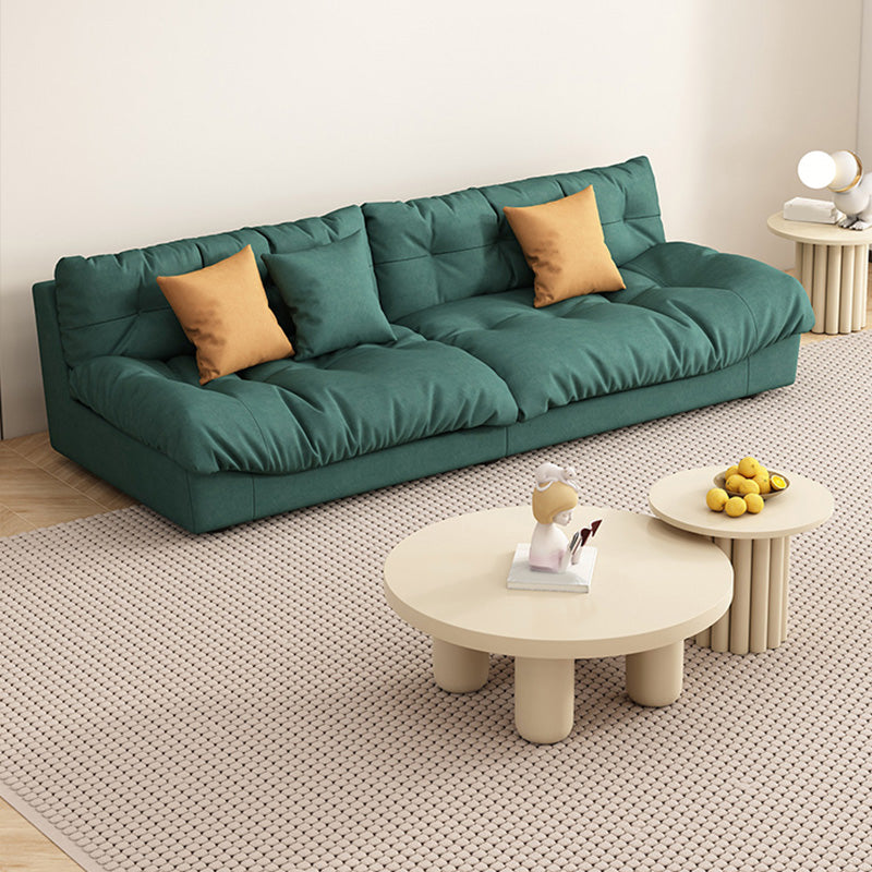 Sofá de tela verde oscuro asientos de apartamentos contemporáneos de apartamento