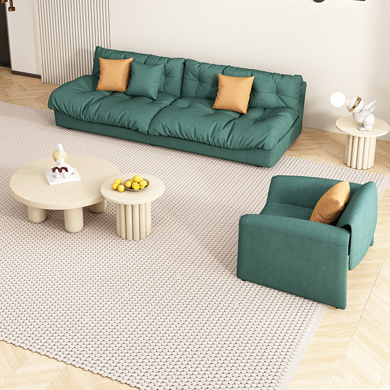 Sofá de tela verde oscuro asientos de apartamentos contemporáneos de apartamento