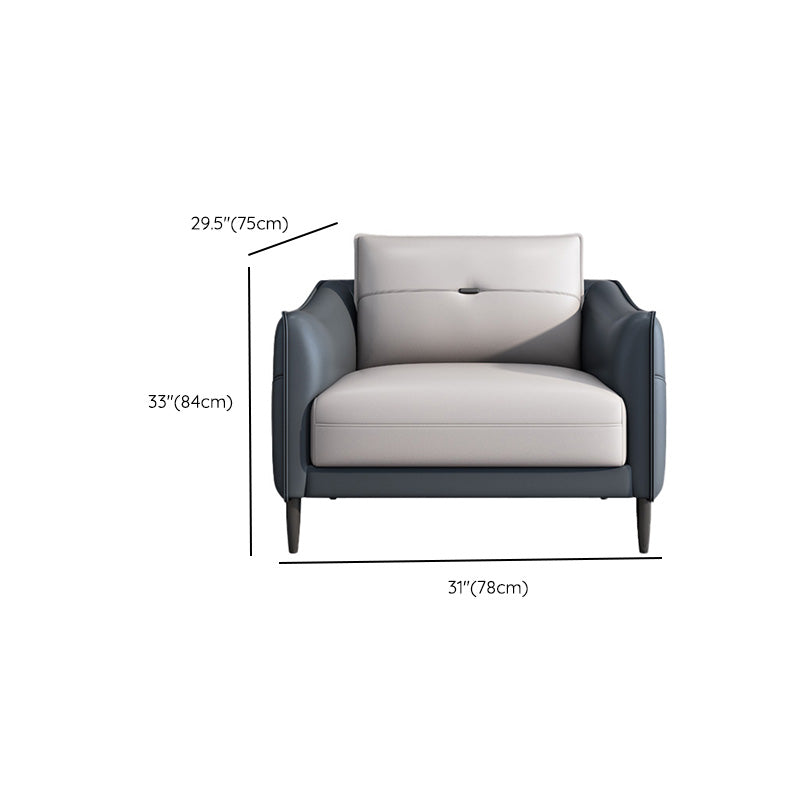 Sofá de cuero gris con cuatro patas sueltas de estilo nórdico de espalda