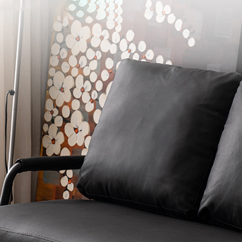 Sofá de metal con almohadas de refuerzo contemporáneas con asientos de cuatro patas