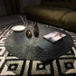 Table basse ronde avec dessus en verre Table de cocktail basse abstraite noire