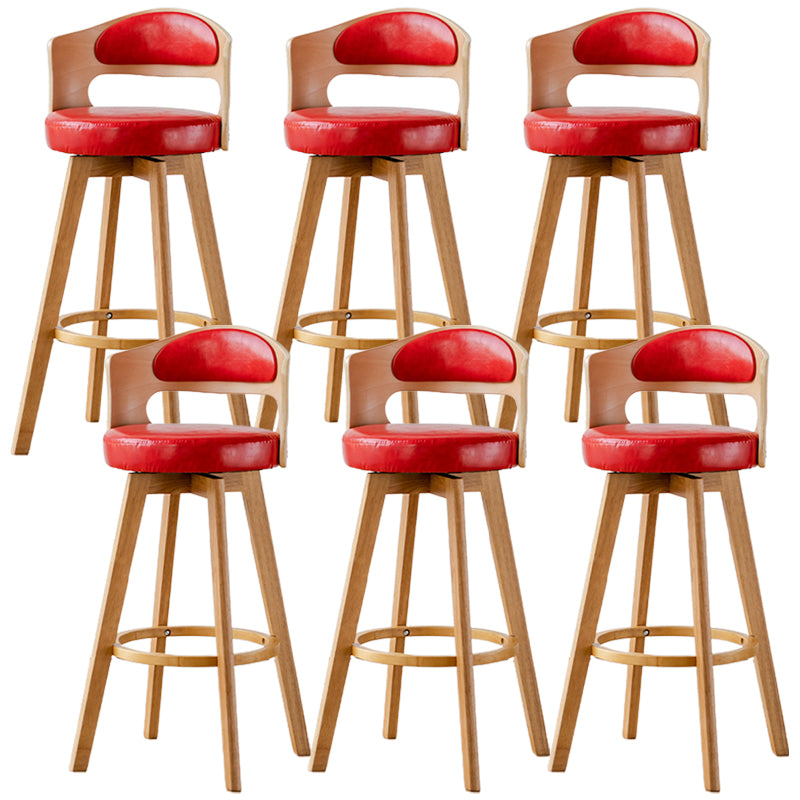 Sgabelli da bar rotondi a braccia rotondi con base in legno