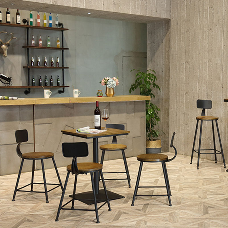 Industrial Black Iron Bar Table Wood 21.65" W Top Indoor Bistro Table with Pedestal Clearhalo 'Bar Furniture' 'Bar Tables' 'bar_tables' 'furn' 'furn_bar_tables' 'Furniture' 'furniture_bar_tables' 'Kitchen & Dining Furniture' 'kitchen&dining_furn' 'kitchen' 6969599